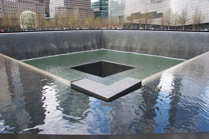 9/11 Memorial at World Trade Center and Financial District Walking Tour - From Charging Bull to Wall Street: symbols, money, and civic anchors