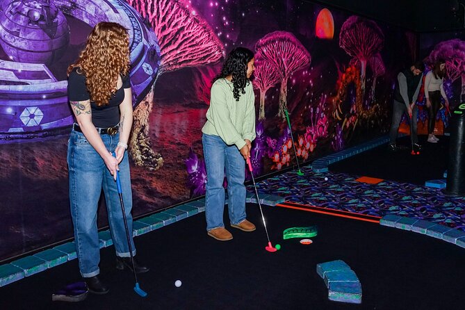 American Dream Black Light Indoor Mini Golf Ticket - The course experience: 18 alien holes under blacklight glow