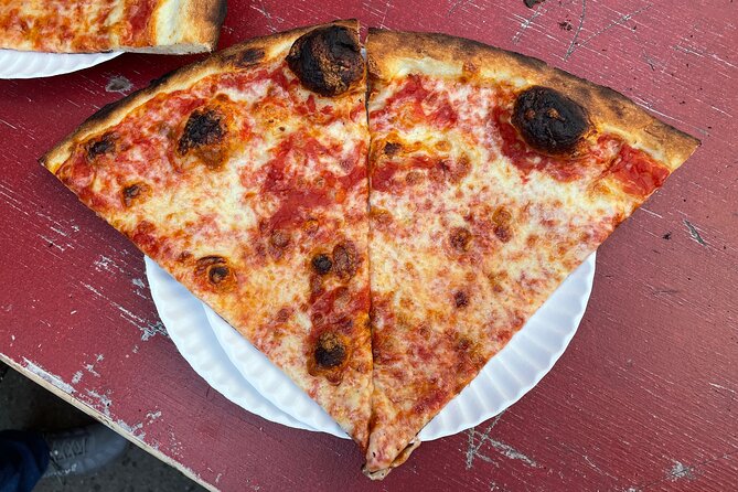 East Village Pizza Walk - Included items vs. what costs extra: slices are covered, toppings and drinks are not