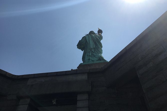 Ellis Island Statue of Liberty and 9/11 Memorial Pools Tour - Ground Zero Museum Workshop: a short walk with heavy context