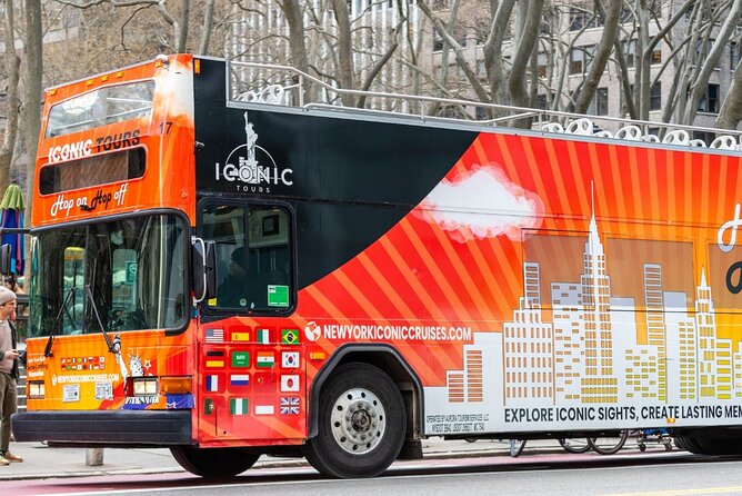 Express Sightseeing Bus Tour with Statue of Liberty Cruise Combo - Downtown approach: World Trade Center area, an old church, and a Wall Street photo stop