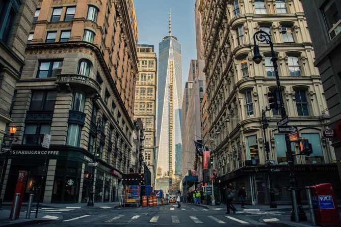 Lower Manhattan & 9/11 Memorial Walking Tour Semi-Private 12ppl - From SeaGlass Carousel to Bowling Green: recovery and the original town square