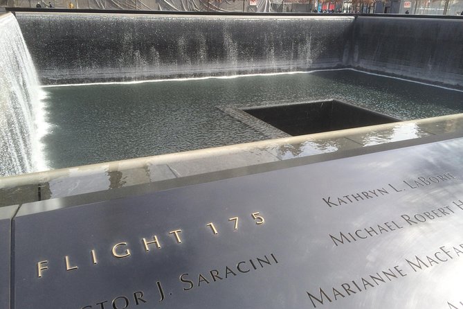 Lower Manhattan Self-Guided Walking Tour and Scavenger Hunt - From Charging Bull to Trinity: iconic photos with actual context