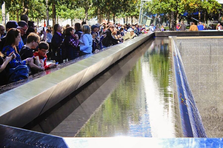 Lower Manhattan Tour: Wall Street & 9/11 Memorial - Starting at 24 Broad St: get your bearings on the first block