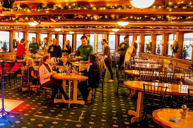 New York City Holiday Sunset Sightseeing Cruise - Passing Ellis Island: why the “drive-by” still matters