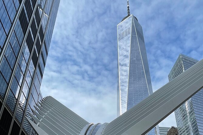 New York City Sightseeing Bus Tour and Boat Ride - A 6-hour bus-and-ferry sampler from Midtown to the harbor