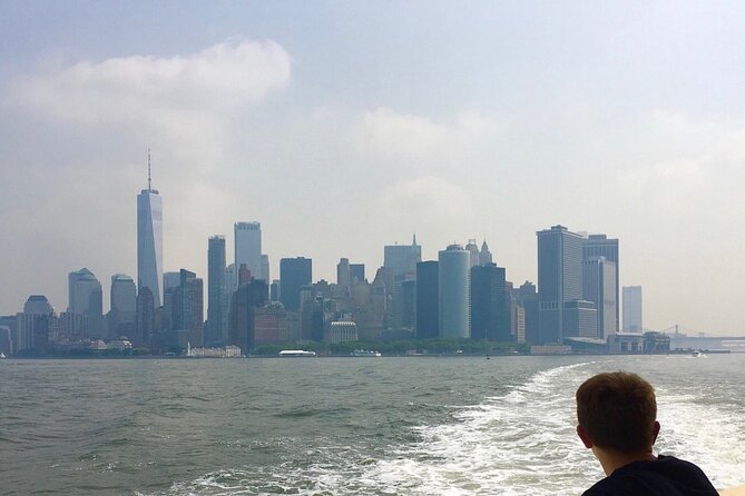 New York City Sightseeing Bus Tour and Boat Ride - Washington Square Park stop: quick walk, photo framing, audio add-on
