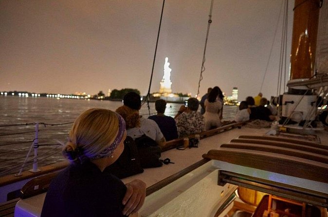 New York City Skyline Night Sailboat Tour - Onboard vibe: small group, helpful crew, and one drink