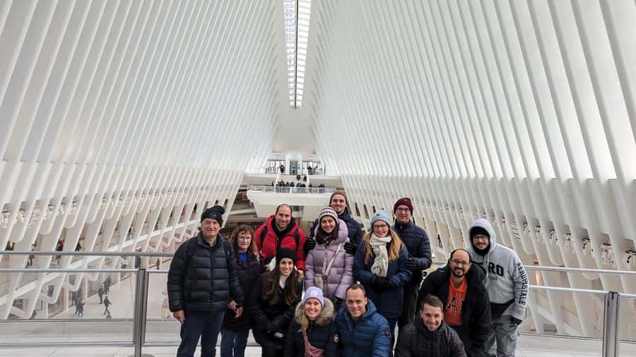 NYC: Brooklyn Bridge, Statue of Liberty, & Manhattan Tour - Wall Street to the Battery: the transition from crowds to water