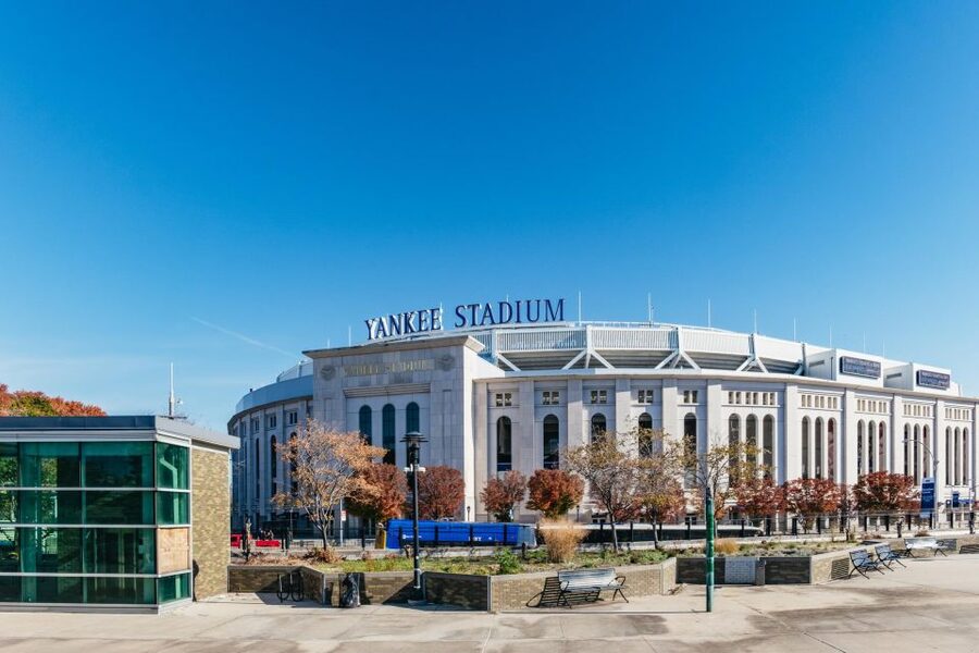 NYC: Brooklyn, Bronx, Queens Sightseeing Bus Tour - Yankee Stadium and Bronx energy: icons plus street-level contrasts