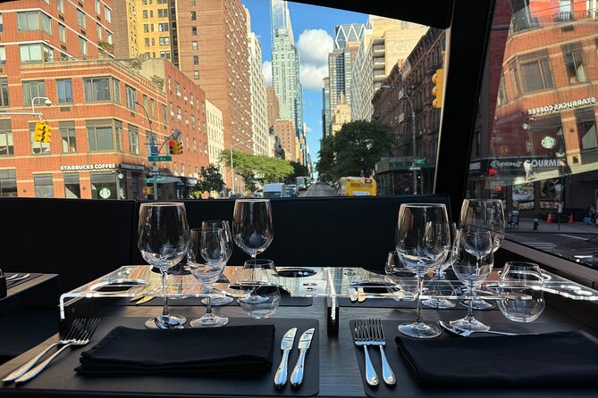 NYC Bustronome Gourmet Sightseeing Dinner tour Panoramic Bus - Time Square: bright, loud, and perfect for night photos