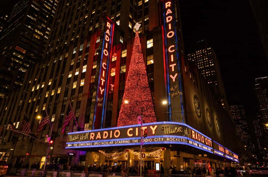 NYC: Christmas Holiday Guided Walking Tour with Dessert - Bryant Park Winter Village: where the tour turns from photos to feeling