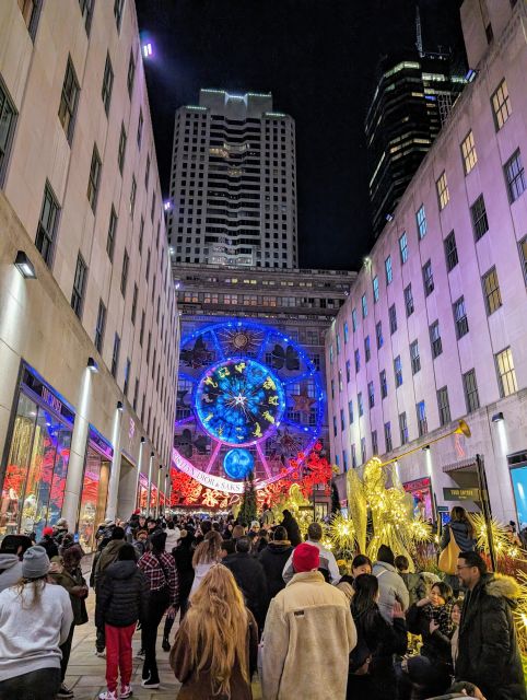 NYC: Holiday Lights Guided Bus Tour - Winter Garden Hall and the Luminaries Light Show moment