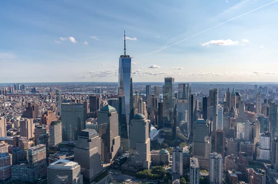NYC: Manhattan Sightseeing Helicopter Tour - Harbor icons: Statue of Liberty, Ellis Island, and the neighborhoods around the water