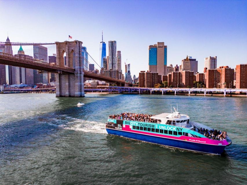 NYC: Manhattan & Statue of Liberty Cruise with Shuttle Bus - Sailing beneath the Brooklyn Bridge: the best photo moment