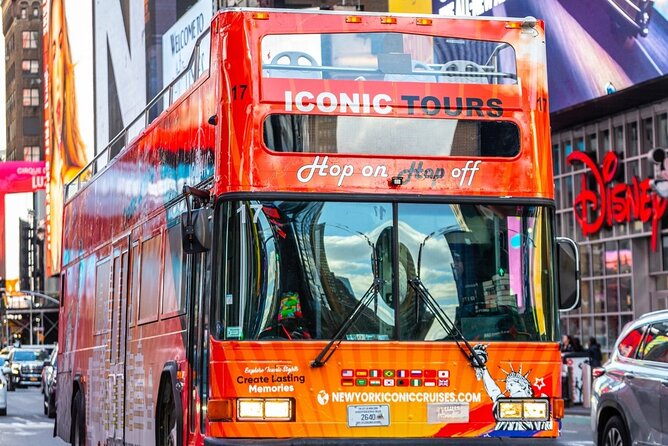 NYC Night Bus Sightseeing Tour with Free Statue of Liberty Cruise - A smart combo: night bus views plus a Statue of Liberty cruise