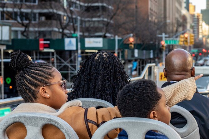 NYC Night Bus Sightseeing Tour with Free Statue of Liberty Cruise - Liberty Island and Ellis Island: using your free cruise voucher without getting burned
