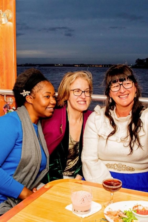 NYC: Night Holiday Lights and Cocoa Cruise - The Onboard Vibe: Holiday Music, Drinks, and How Seating Works