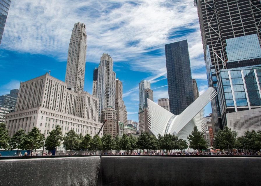 NYC: Sightseeing Day Trip with Statue of Liberty Visit - Starting in the City: Bus Sightseeing and Staff Support