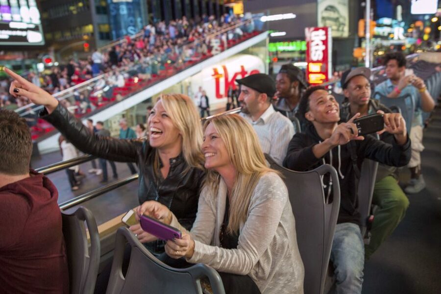 NYC: Sightseeing Night Tour by Open-Top Bus with Live Guide - Bridge views: Brooklyn Bridge presence and the Manhattan Bridge photo moment