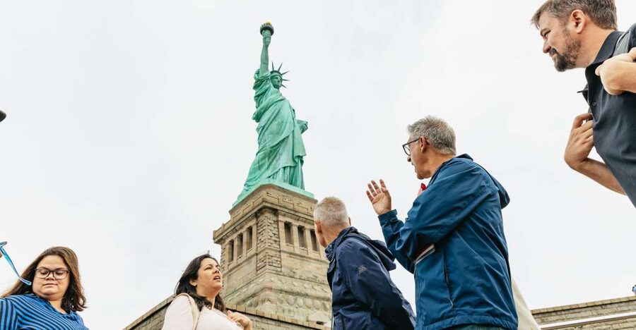NYC: Statue of Liberty and Ellis Island Guided Tour - Castle Clinton to Battery Park ferry: the short walk that sets context