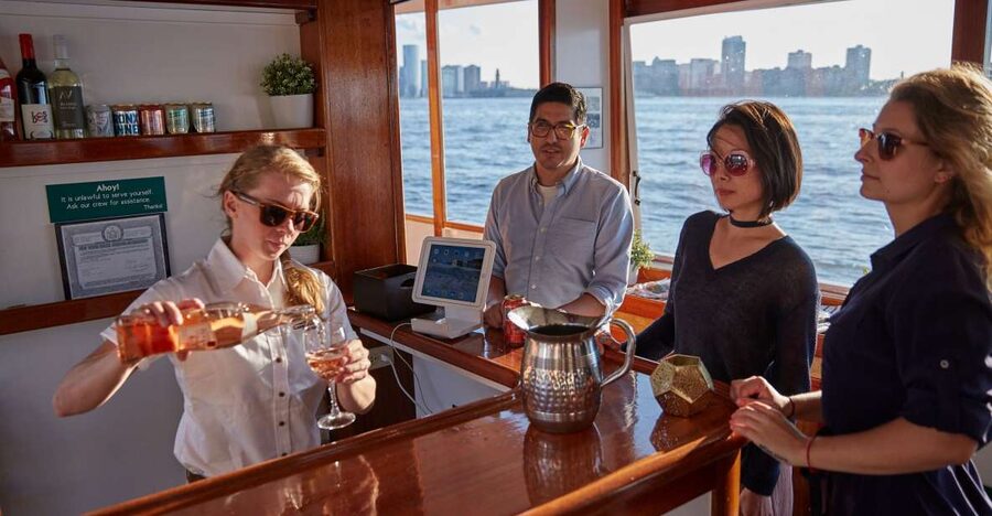 NYC: Sunset Cruise on a Small Yacht with a Drink - Drinks and light tapas: included value vs. pay-for-more