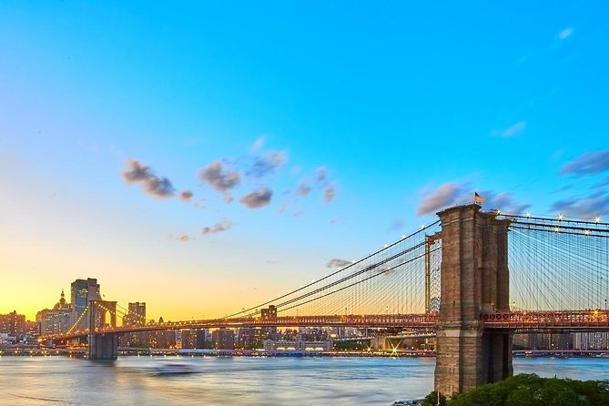 Statue of Liberty and Ellis Island Sunset Cruise - Departing Under the Brooklyn Bridge: The Skyline Moment
