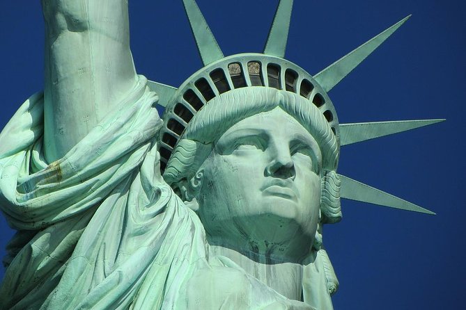 Statue of Liberty, Ellis Island, and 9/11 Memorial Guided Tour - Battery Park and Castle Clinton: Where the Day Starts Making Sense