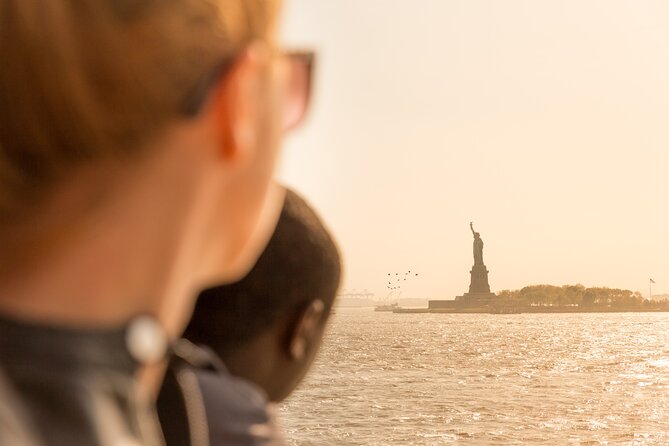 Statue of Liberty & Ellis Island Guided Tour with Ferry Transfers - Liberty Island: close-up views and museum context in 45 minutes