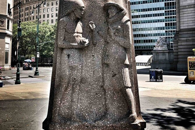 The Battery: A Self-Guided Audio Tour from Bowling Green Park to Stone St - The Immigrants statue: Annie Moore and the Ellis Island moment