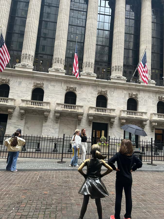 Wall Street: The birth place of NYC in French/English tour - Old print shop beginnings, a first paved street, and the quiet pockets people miss