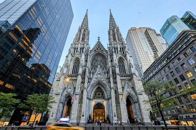 Wall Street to Chinatown: Dumplings & Taro bites walking tour - Charging Bull and Trinity Church: the start that sets your mood
